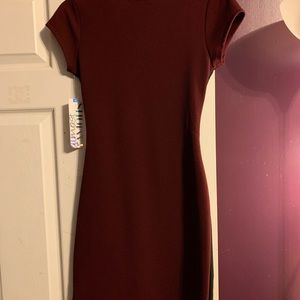 Fitted maroon dress.